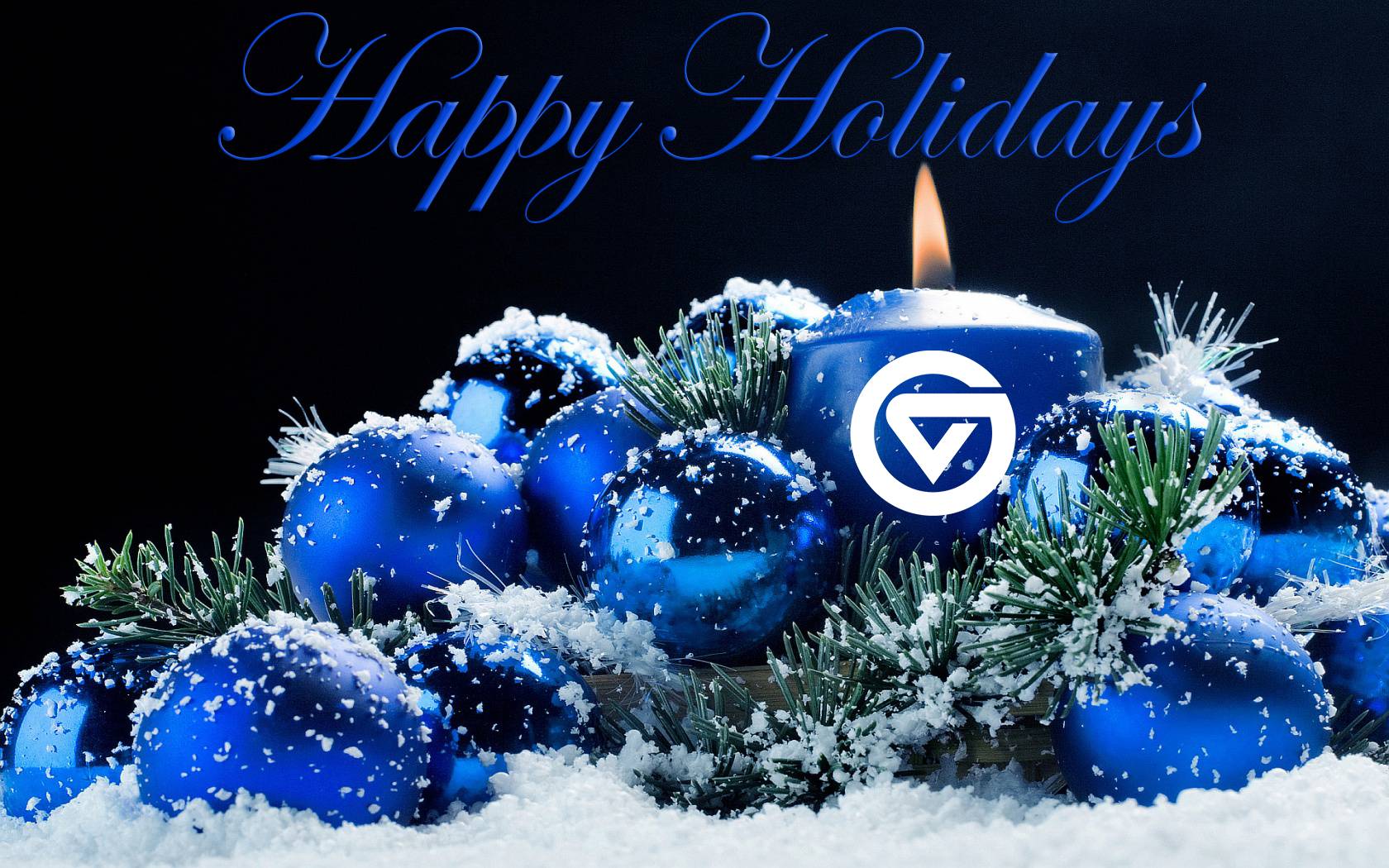 Blue holiday candles with GVSU logo.